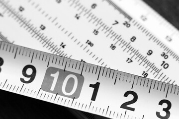 Measuring tool and tape measure, black and white