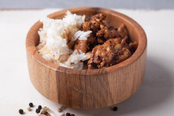 Garlic Pepper Chicken Fried Rice in Wooden Cups on White Background