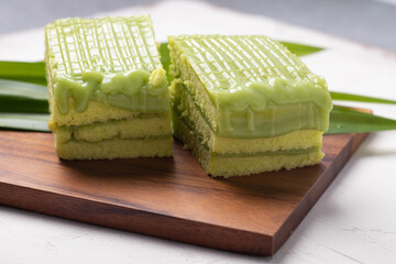The cake is a layer of Pandan custard. Thai dessert
