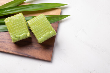 The cake is a layer of Pandan custard. Thai dessert