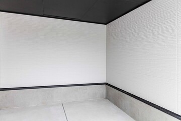Perspective of Empty white basement concrete room.