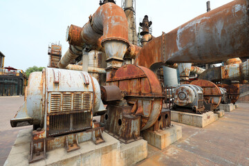 Fototapeta na wymiar Unused and abandoned metal pipes in factories