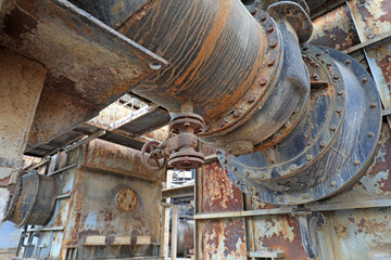 Unused and abandoned metal pipes in factories