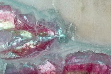 red and cyan fluorite close-up texture