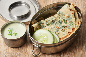 Wheat Dosa, goduma dosa Chilli, curry leaf top view. Low fat South Indian dish best with coconut chutney. Easy make meal for breakfast use whole wheat in Andhra Pradesh, Karnataka, Tamil nadu, Kerala