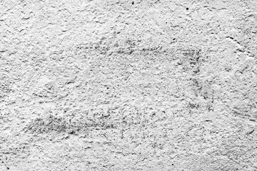 Texture of a concrete wall with cracks and scratches which can be used as a background