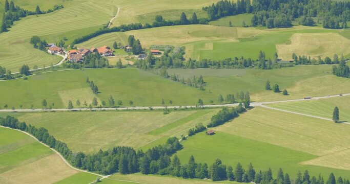 Farming fields and the federal highway B17 near Schwangau, Germany on a hot summer day.