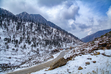 Snowy white peaks of Nathula Pass at Sikkim, India