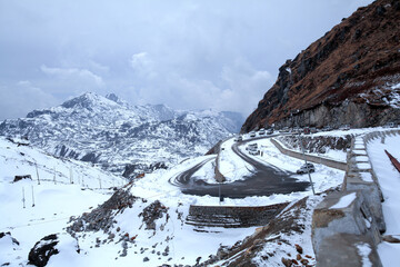 Snowy white peaks of Nathula Pass at Sikkim, India