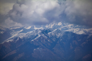 Fototapeta na wymiar Snowy white peaks of Nathula Pass at Sikkim, India