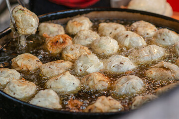 Deep fried chinese bun with cabbage stuff