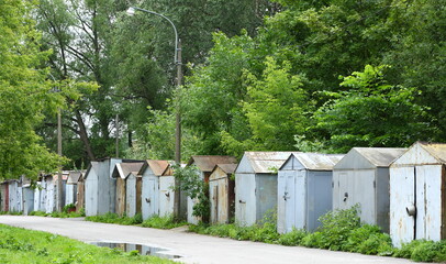 Row of grey metal garages in the courtyard