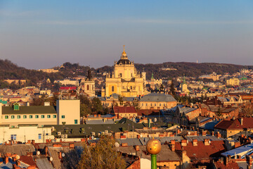 Fototapeta premium Aerial view of St. George's Cathedral and old town of Lviv in Ukraine. Lvov cityscape. View from bell tower of Church of Sts. Olha and Elizabeth