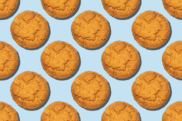 Healthy oatmeal cookies seamless trend pattern isolated on blue background. Top view