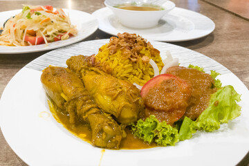 chicken biryani with curry sauce