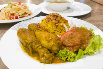 chicken biryani with curry sauce