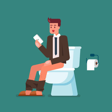 Businessman using smartphone when sitting on toilet bowl