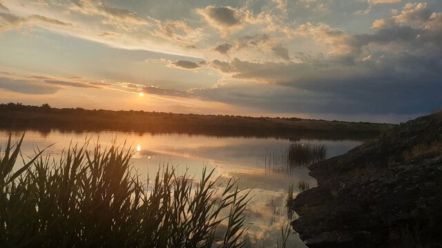 sunset over the lake © Sab