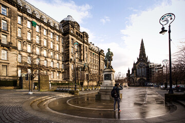 Glasgow Cathedral square with David Livingstone monument on rainy day - 363120844