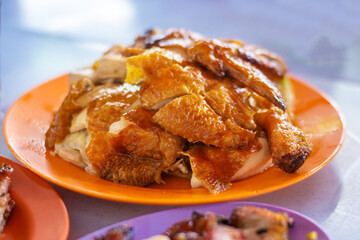 chopped chinese chicken  roasted on colorful plate