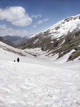 Manali, India - June 14th 2019: Struggle while Climbing Mountain to reach top peak in a huge snow field.