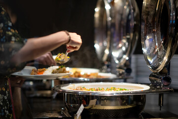 several food on buffet line catering