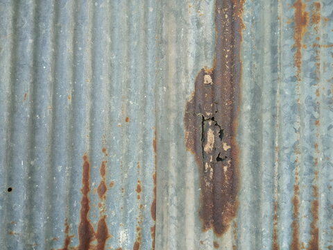 Old Zinc Plate Wall Covered With Red Rust Texture Background.