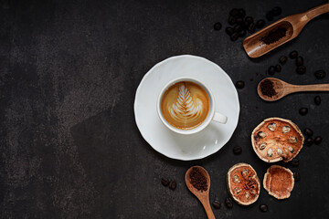Cup of coffee and Coffee composition on black background. Copy space. Top view. Flat lay.