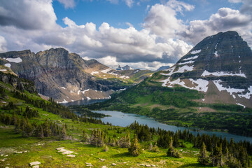 The hidden lake and mountains in Glacier National Park, in Montana, on a cloudy day.