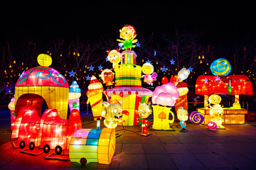 cartoon figure sculpture in the night, Tangshan City, Hebei Province, China