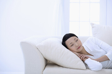 Woman taking a nap on the couch