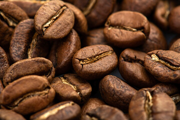 Coffee beans close-up background. Fresh roasted