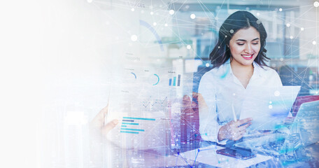 Abstract business background with Indian woman reading document / contract / fund performance in...