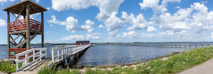 Tower and bridge going out into the water