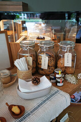 Assorted cookies jar decorated on wooden table