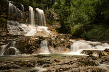 Fototapeta na wymiar Scenic View Of Waterfall In Forest, Longtime Exposure