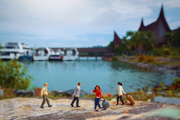 Mini Figure Travelers walks out of the ferry port