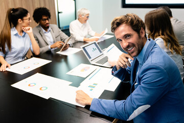 Creative business people working on business project in office