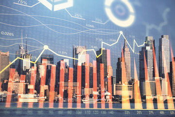 Forex graph on city view with skyscrapers background double exposure. Financial analysis concept.