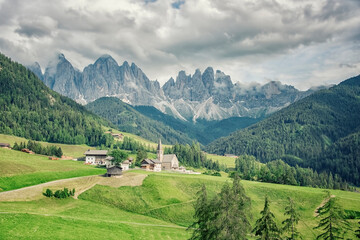 Santa Maddalena village with beautiful Dolomites mountains in the background, Val di Funes valley, Italy