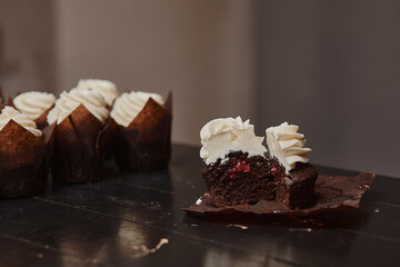 Cooking delicious homemade muffins with strawberry jam. Homemade baking.