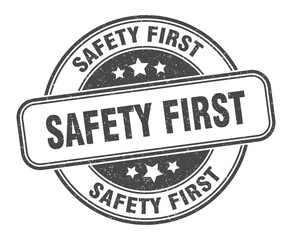 safety first stamp. safety first round grunge sign. label
