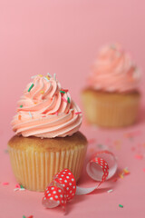 Pink cupcakes on a pink background