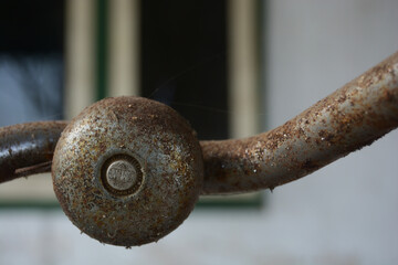 close up of an old rusty metal hook