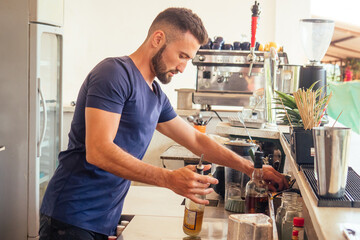 arabic man bartender making fresh coctail for lady