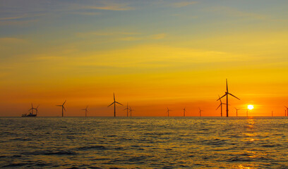 Beautiful sunset at the North Sea offshore wind farm