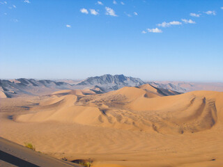 Fototapeta na wymiar Scenic View Of Desert Against Blue Sky