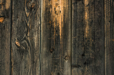 Texture of an old weathered wooden board with peeling paint. Vintage rough grunge background