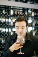 Man enjoying a glass of wine