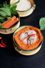 Thai steamed fish curry in tiffin